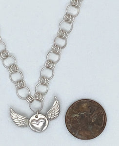 Winged heart necklace