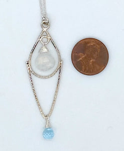 Rainbow moonstone, sky blue topaz, and silver necklace