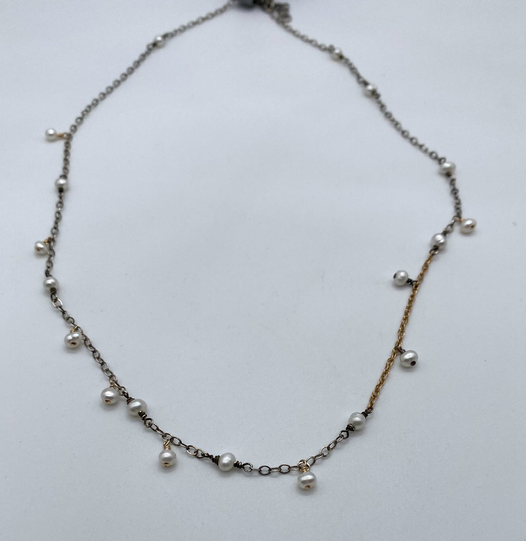 Pearl, silver, and gold necklace