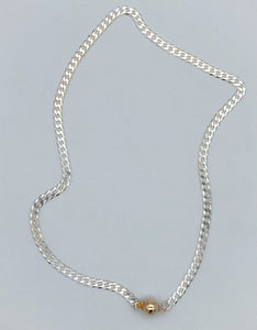 Silver curb chain with gold clasp
