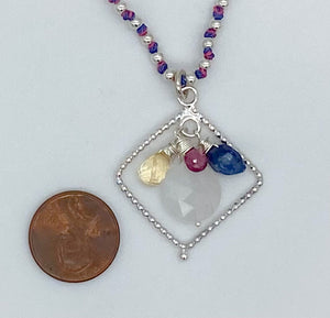 Rainbow moonstone, pink tourmaline, citrine, and kyanite necklace