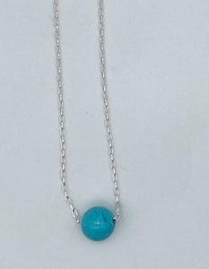 Floating stone necklace