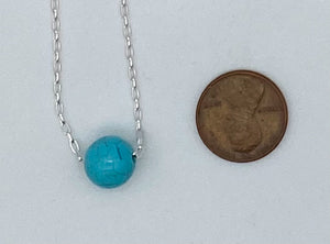 Floating stone necklace