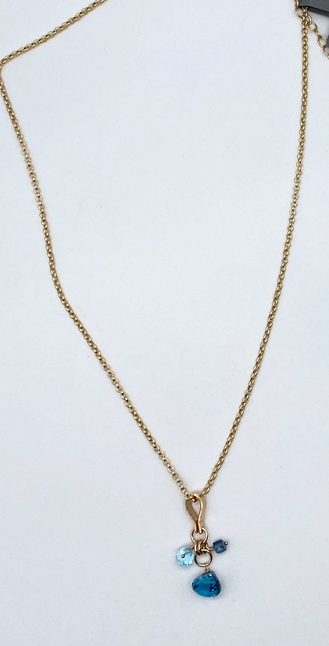 Blue topaz and gold necklace